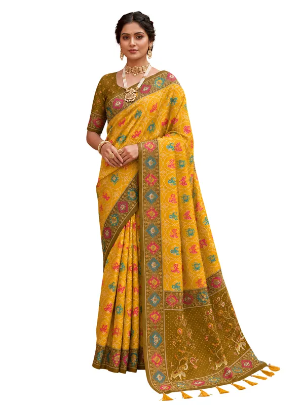 Yellow_Ajrakh_Printed_Designer_Patola_Saree_with_Contrast_Border_&_Tassel_Pallu