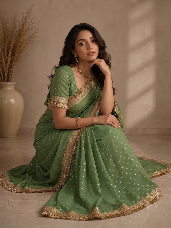 Green_Zari_Embellished_Saree_With_Golden_Lace_Border