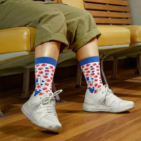 White_Cotton_Paw_Print_Novelty_Socks_With_Blue_Trim
