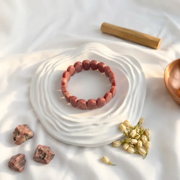 Rhodonite_Bracelet_–_Faceted_Oval_Beads_for_Emotional_Balance