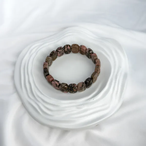 Black_Veined_Rhodonite_Bracelet_–_Faceted_Oval_Beads