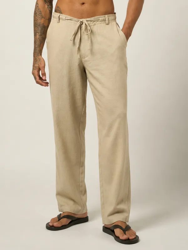 Sand_Beige_Linen_Relaxed_Fit_Drawstring_Trousers_For_Men