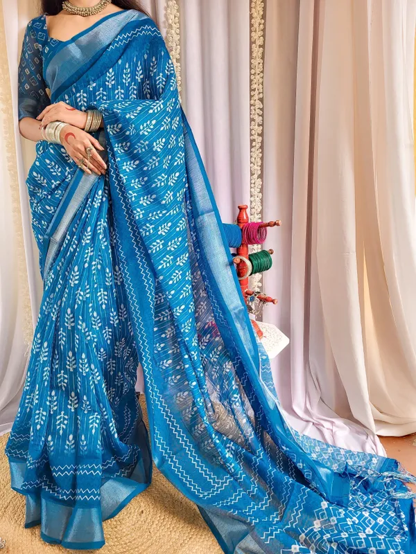 Elegant_Blue_Pure_Linen_Saree_with_Tassels_and_White_Floral_Patterns