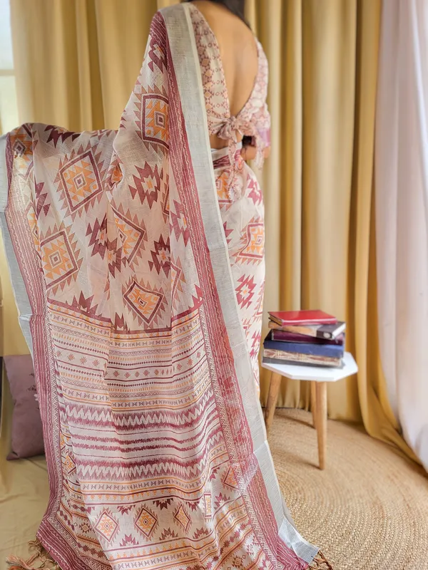 Ivory_Linen_Saree_with_Geometric_Tribal_Prints_&_Tassel_Accents