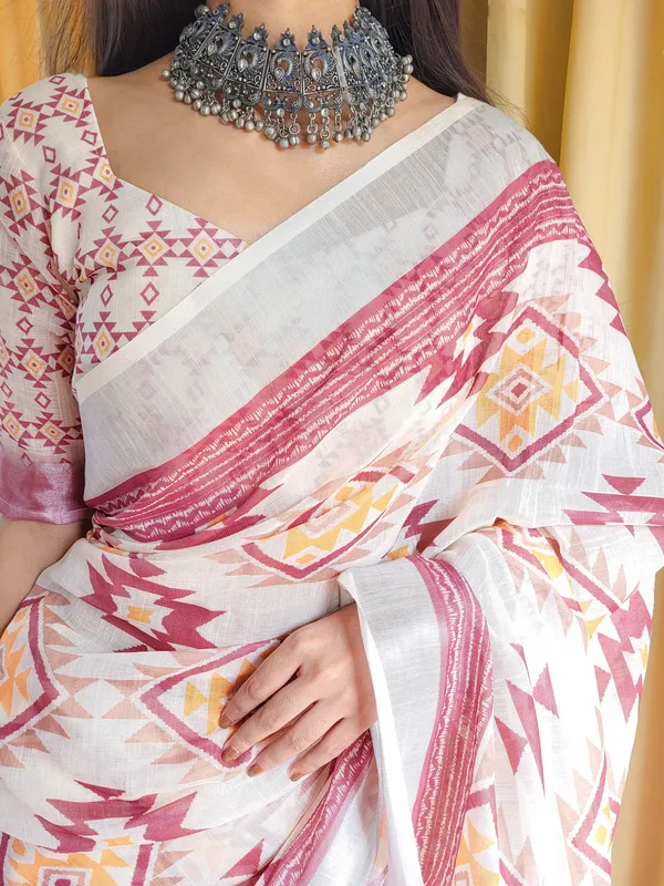 Ivory_Linen_Saree_with_Geometric_Tribal_Prints_&_Tassel_Accents