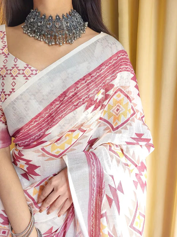 Ivory_Linen_Saree_with_Geometric_Tribal_Prints_&_Tassel_Accents