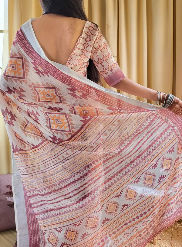 Ivory_Linen_Saree_with_Geometric_Tribal_Prints_&_Tassel_Accents