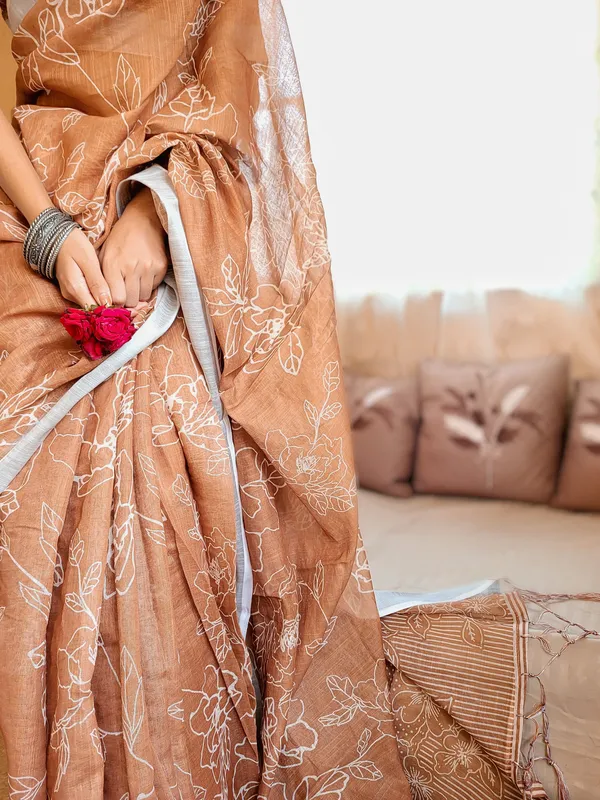 Rust_Brown_Pure_Linen_Saree_with_White_Floral_Motifs_and_Tassel_Detailing