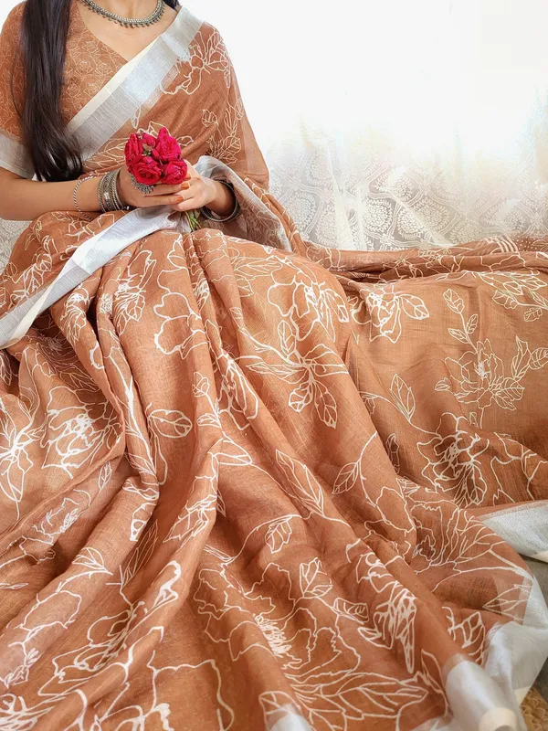 Rust_Brown_Pure_Linen_Saree_with_White_Floral_Motifs_and_Tassel_Detailing