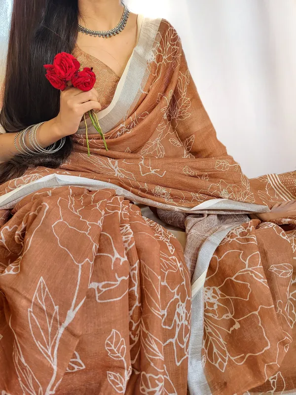 Rust_Brown_Pure_Linen_Saree_with_White_Floral_Motifs_and_Tassel_Detailing