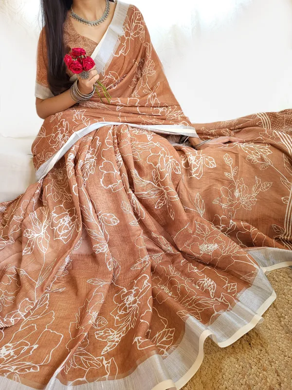 Rust_Brown_Pure_Linen_Saree_with_White_Floral_Motifs_and_Tassel_Detailing