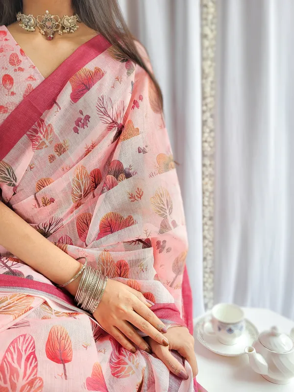 Blush_Pink_Handwoven_Linen_Saree_with_Vibrant_Autumn_Motifs_&_Tassel_Detailing