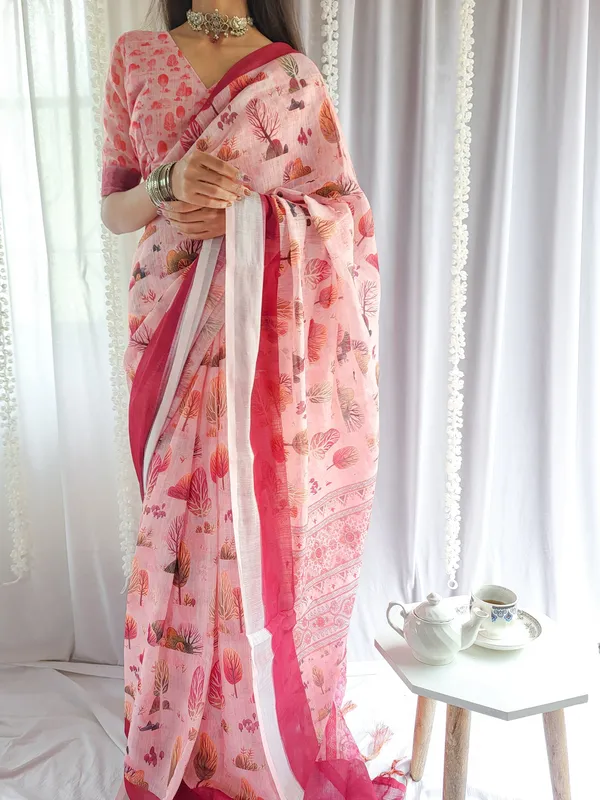 Blush_Pink_Handwoven_Linen_Saree_with_Vibrant_Autumn_Motifs_&_Tassel_Detailing