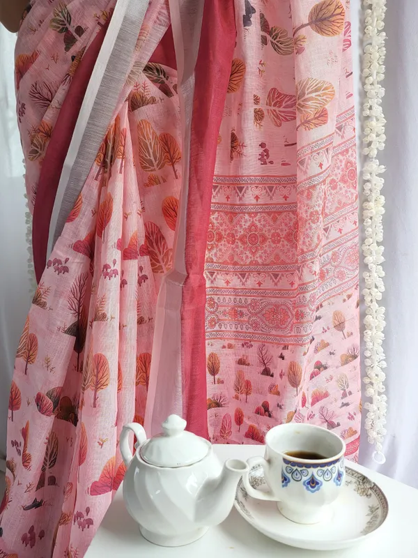 Blush_Pink_Handwoven_Linen_Saree_with_Vibrant_Autumn_Motifs_&_Tassel_Detailing