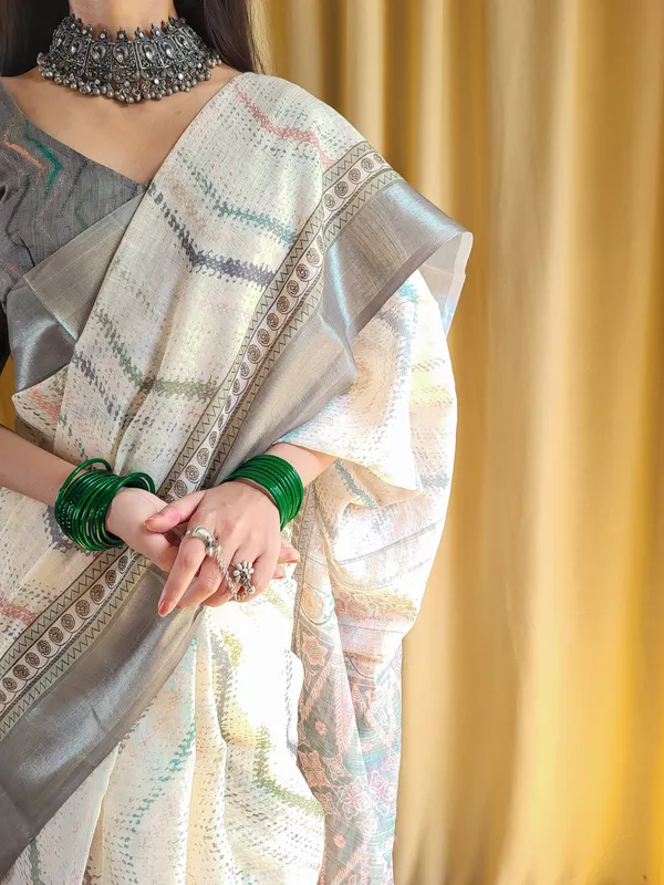Elegant_Beige_Pure_Linen_Saree_with_Multicolor_Zigzag_Design_and_Tassel_Finish