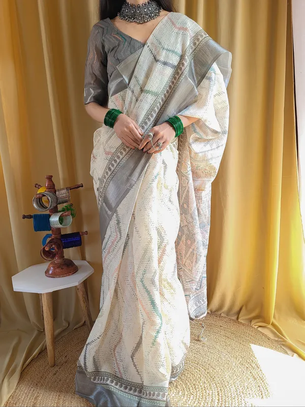 Elegant_Beige_Pure_Linen_Saree_with_Multicolor_Zigzag_Design_and_Tassel_Finish