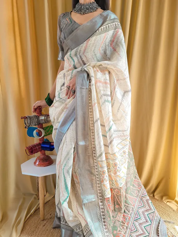 Elegant_Beige_Pure_Linen_Saree_with_Multicolor_Zigzag_Design_and_Tassel_Finish