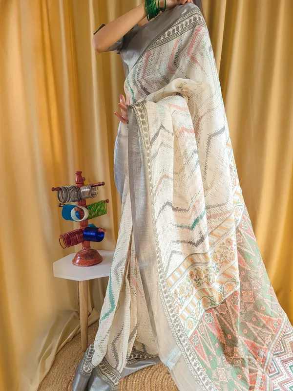 Elegant_Beige_Pure_Linen_Saree_with_Multicolor_Zigzag_Design_and_Tassel_Finish
