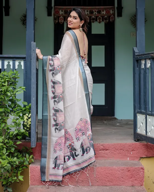 Ivory_Pure_Cotton_Linen_Saree_with_Elephant_Motif_and_Tassel_Detailing