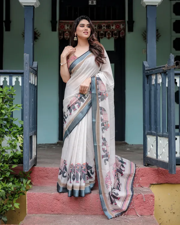 Ivory_Pure_Cotton_Linen_Saree_with_Elephant_Motif_and_Tassel_Detailing