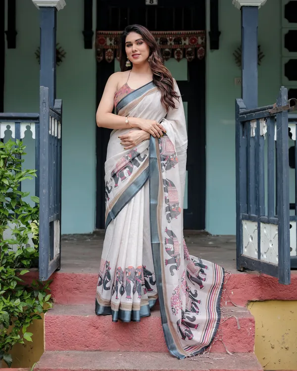 Ivory_Pure_Cotton_Linen_Saree_with_Elephant_Motif_and_Tassel_Detailing
