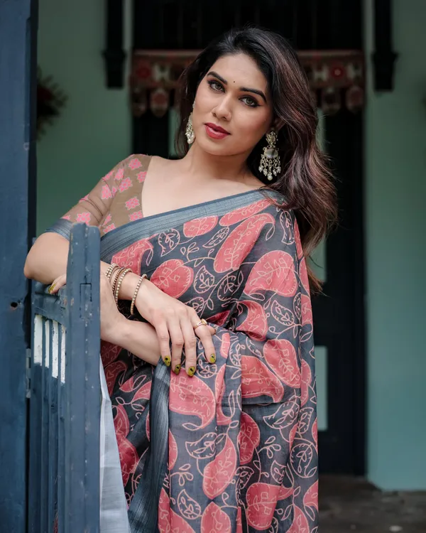 Charcoal_Black_Pure_Cotton_Linen_Saree_with_Leafy_Paisley_Print,_Blouse,_and_Tassel_Detailing