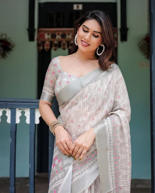 Soft_Grey_Pure_Cotton_Linen_Saree_with_Pink_and_White_Ikat_Design,_Blouse,_and_Tassel_Detailing