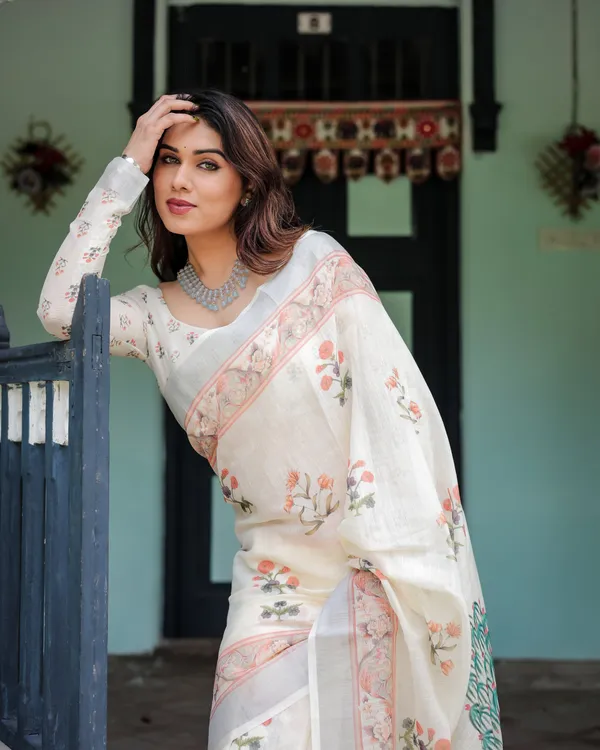 Ivory_Pure_Cotton_Linen_Saree_with_Pastel_Floral_Design,_Blouse,_and_Tassel_Detailing