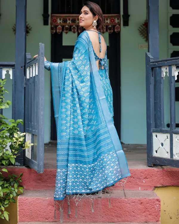 Turquoise_Pure_Cotton_Linen_Saree_with_White_Floral_Design,_Blouse,_and_Tassel_Edges
