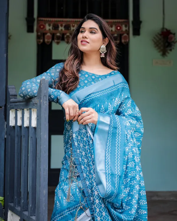 Turquoise_Pure_Cotton_Linen_Saree_with_White_Floral_Design,_Blouse,_and_Tassel_Edges