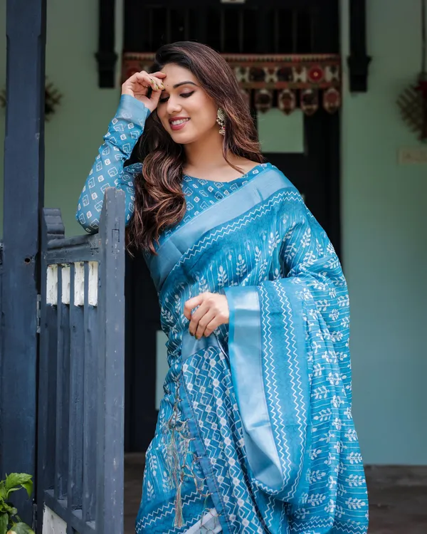 Turquoise_Pure_Cotton_Linen_Saree_with_White_Floral_Design,_Blouse,_and_Tassel_Edges