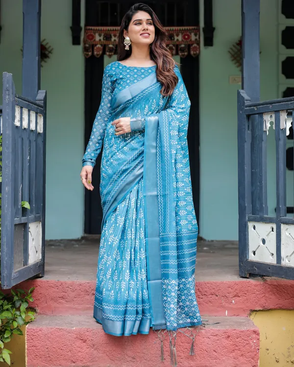 Turquoise_Pure_Cotton_Linen_Saree_with_White_Floral_Design,_Blouse,_and_Tassel_Edges