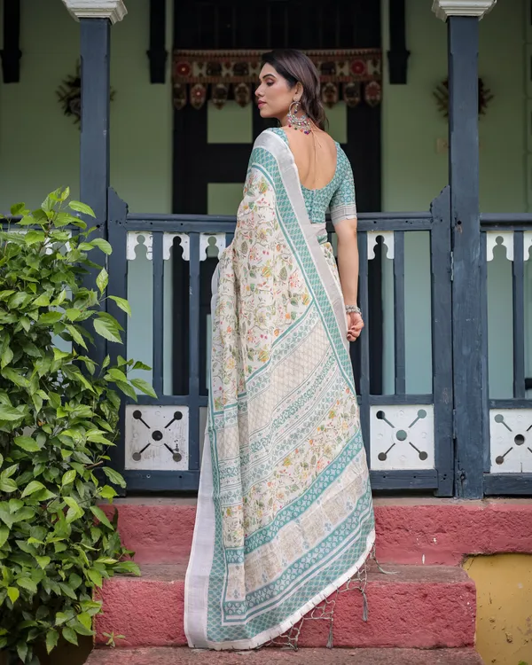 Elegant_Floral_Printed_Pure_Cotton_Linen_Saree_in_Ivory_with_Teal_Border_and_Blouse,_Tassels_on_Edges