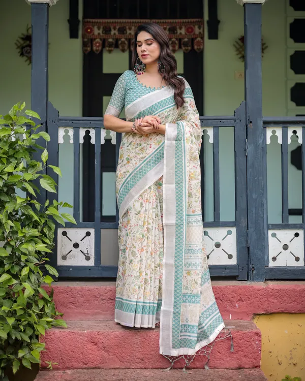 Elegant_Floral_Printed_Pure_Cotton_Linen_Saree_in_Ivory_with_Teal_Border_and_Blouse,_Tassels_on_Edges