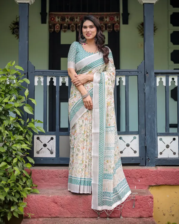Elegant_Floral_Printed_Pure_Cotton_Linen_Saree_in_Ivory_with_Teal_Border_and_Blouse,_Tassels_on_Edges
