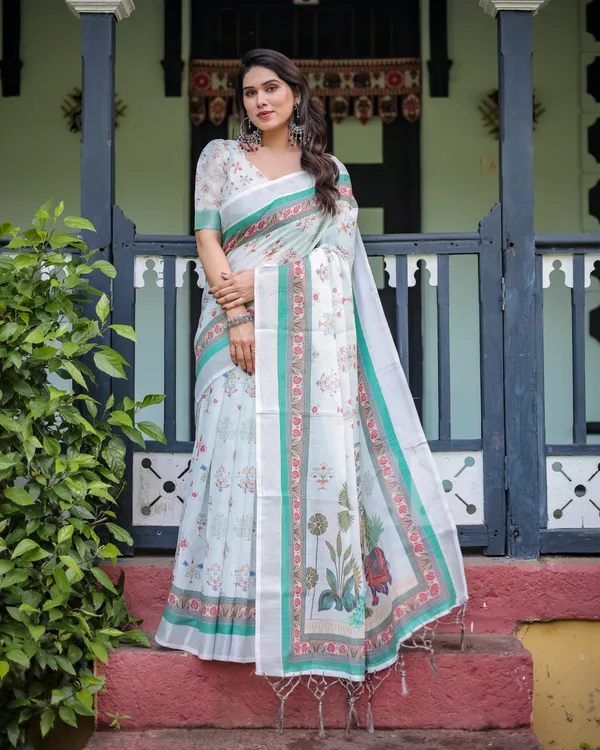 Ivory_Pure_Cotton_Linen_Saree_with_Elephant_Motif_and_Floral_Pattern,_Green_and_Pink_Borders,_and_Tassels_on_Edges.
