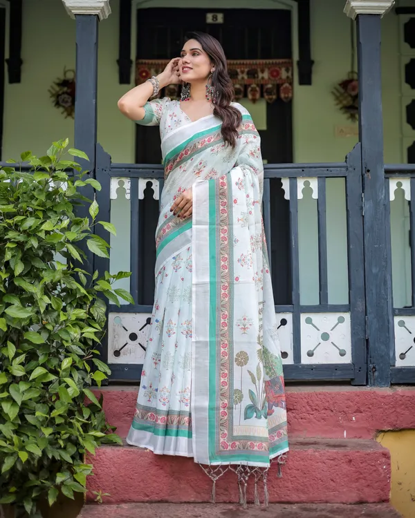 Ivory_Pure_Cotton_Linen_Saree_with_Elephant_Motif_and_Floral_Pattern,_Green_and_Pink_Borders,_and_Tassels_on_Edges.