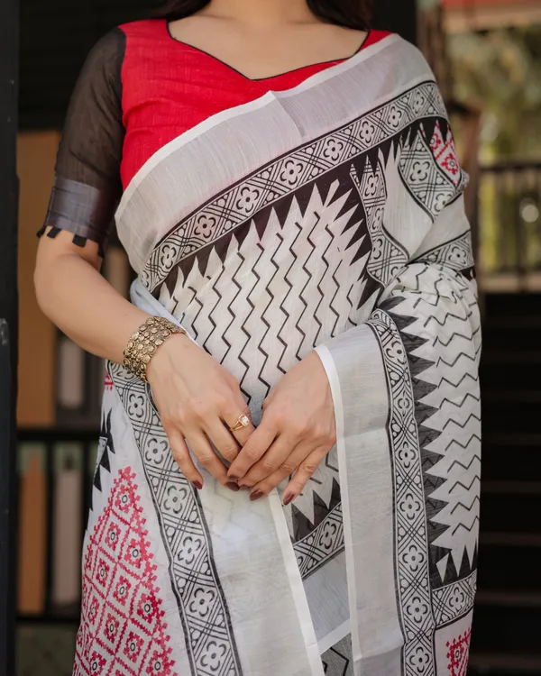 Black_and_White_Geometric_Pattern_Pure_Cotton_Linen_Saree_with_Red_Accents,_Blouse,_and_Tassel_Details