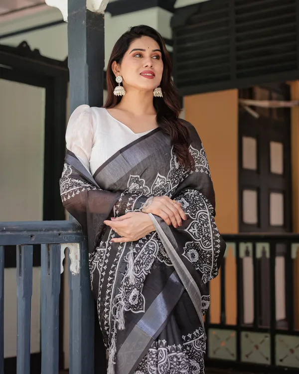 Black_and_White_Pure_Cotton_Linen_Saree_with_Intricate_Floral_Design_and_Tassels_on_Edges