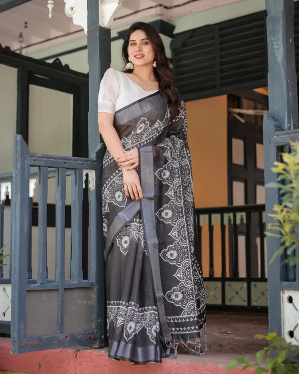 Black_and_White_Pure_Cotton_Linen_Saree_with_Intricate_Floral_Design_and_Tassels_on_Edges