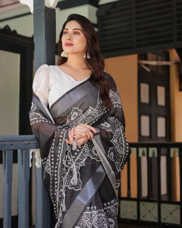 Black_and_White_Pure_Cotton_Linen_Saree_with_Intricate_Floral_Design_and_Tassels_on_Edges