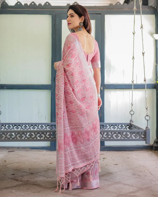 Elegant_Rose_Pink_Pure_Cotton_Linen_Saree_with_White_Thread_Work,_Matching_Blouse,_and_Tassel_Edges