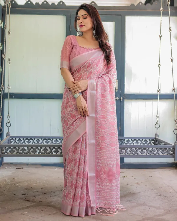 Elegant_Rose_Pink_Pure_Cotton_Linen_Saree_with_White_Thread_Work,_Matching_Blouse,_and_Tassel_Edges