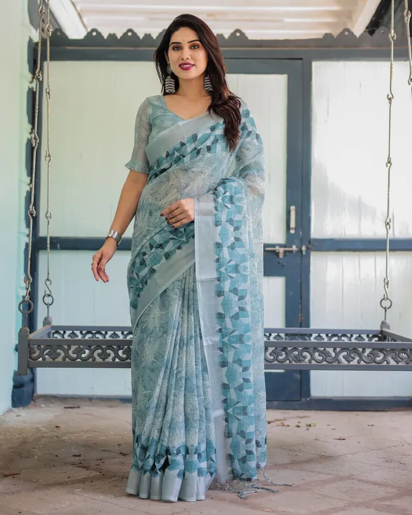 Light_Blue_Pure_Cotton_Linen_Saree_with_Geometric_and_Floral_Patterns,_Blouse,_and_Tassels