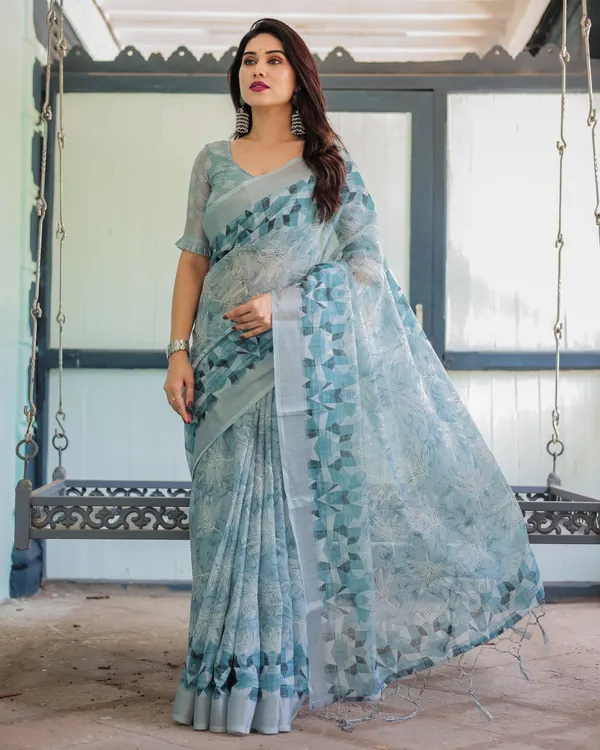 Light_Blue_Pure_Cotton_Linen_Saree_with_Geometric_and_Floral_Patterns,_Blouse,_and_Tassels