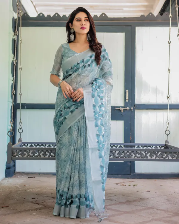 Light_Blue_Pure_Cotton_Linen_Saree_with_Geometric_and_Floral_Patterns,_Blouse,_and_Tassels