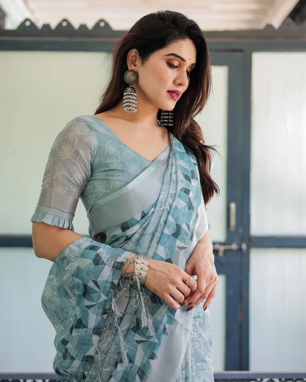 Light_Blue_Pure_Cotton_Linen_Saree_with_Geometric_and_Floral_Patterns,_Blouse,_and_Tassels