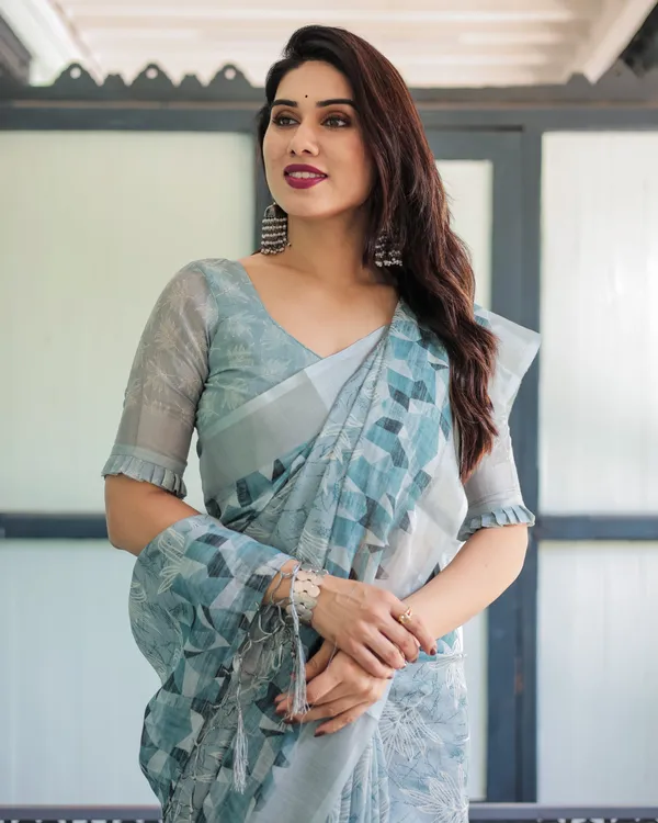 Light_Blue_Pure_Cotton_Linen_Saree_with_Geometric_and_Floral_Patterns,_Blouse,_and_Tassels