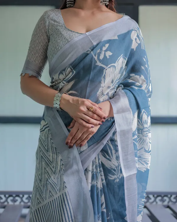 Pastel_Blue_Floral_and_Geometric_Printed_Cotton_Linen_Saree_with_Blouse_and_Tassel_Edges