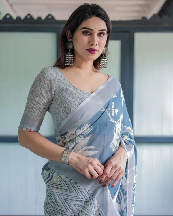 Pastel_Blue_Floral_and_Geometric_Printed_Cotton_Linen_Saree_with_Blouse_and_Tassel_Edges